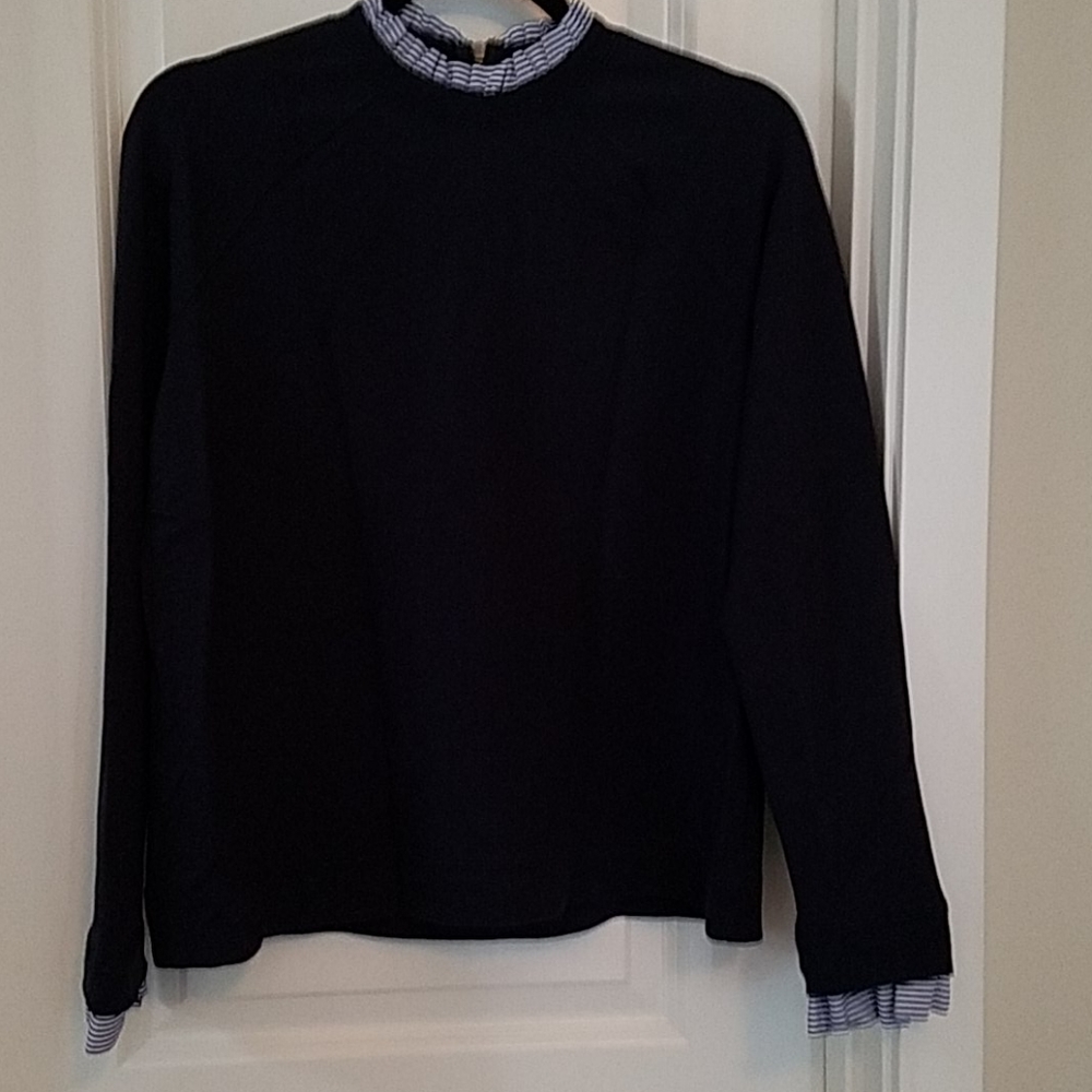 Navy blue long sleeve top with faux blue and white